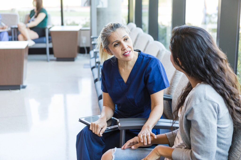 Doctor consoles patient